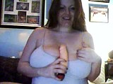 alia glass plays with her big tits webcam